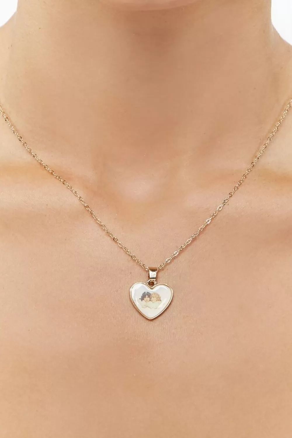 Necklaces>Forever 21 Cherub Heart Pendant Necklace Gold