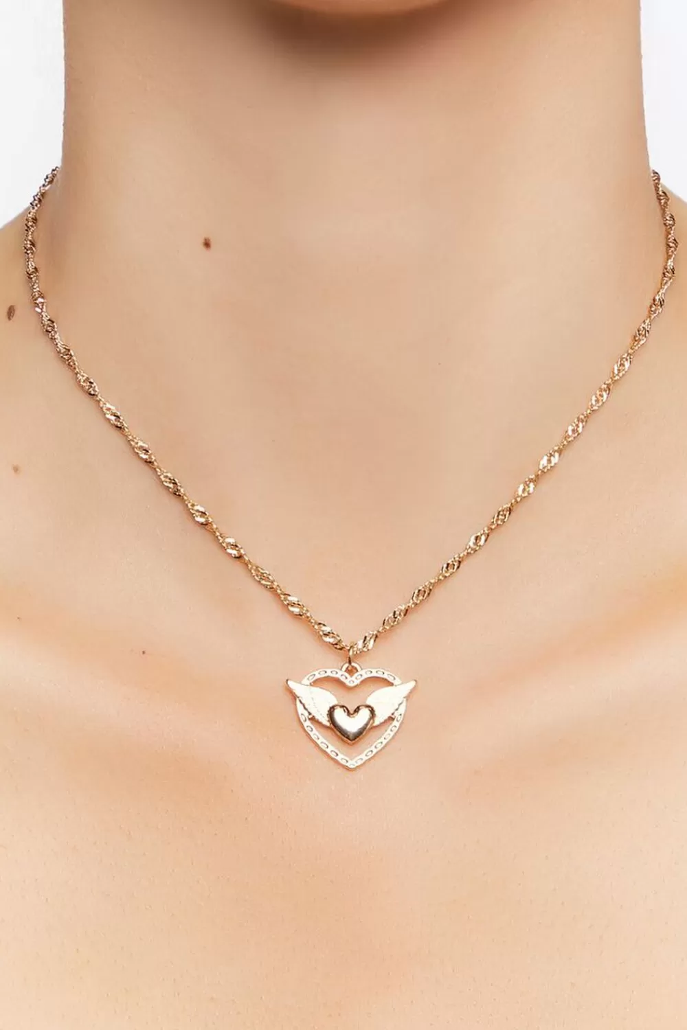 Necklaces>Forever 21 Upcycled Winged Heart Necklace Gold