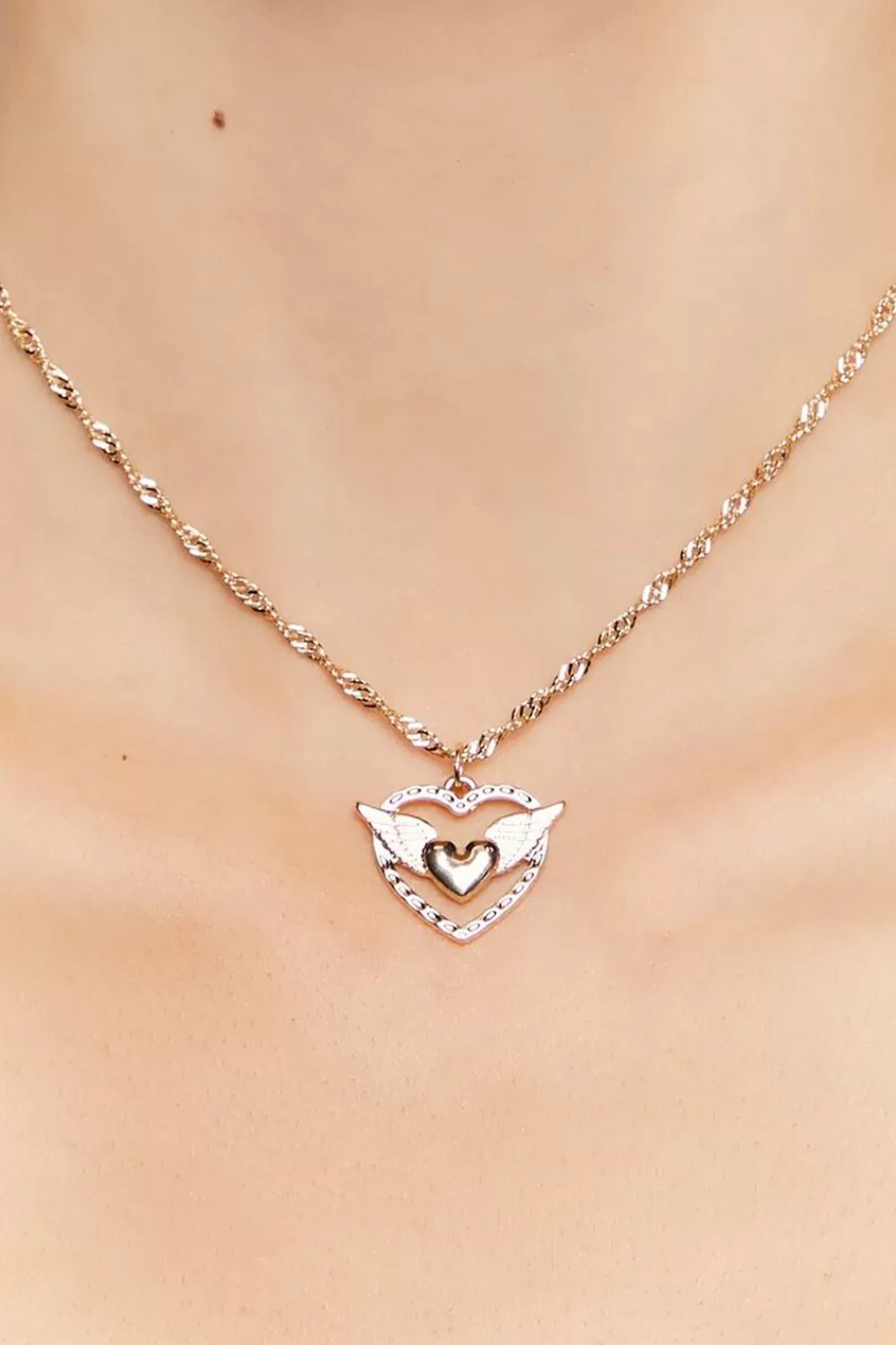 Necklaces>Forever 21 Upcycled Winged Heart Necklace Gold